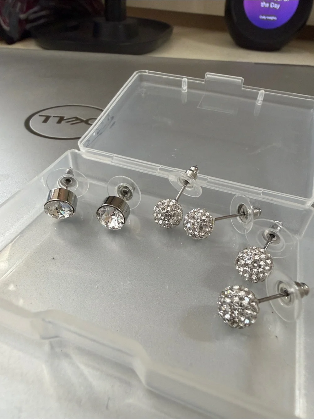 4 pairs sparkle studs. Never worn. So cute and sparkly.